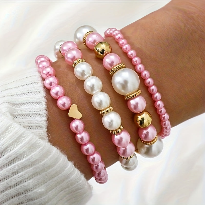 Conjunto de pulseras elegantes con perlas y corazón