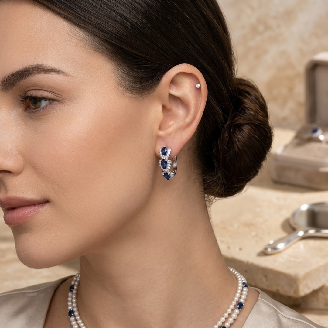 Boucles d'oreilles créoles halo saphir en argent