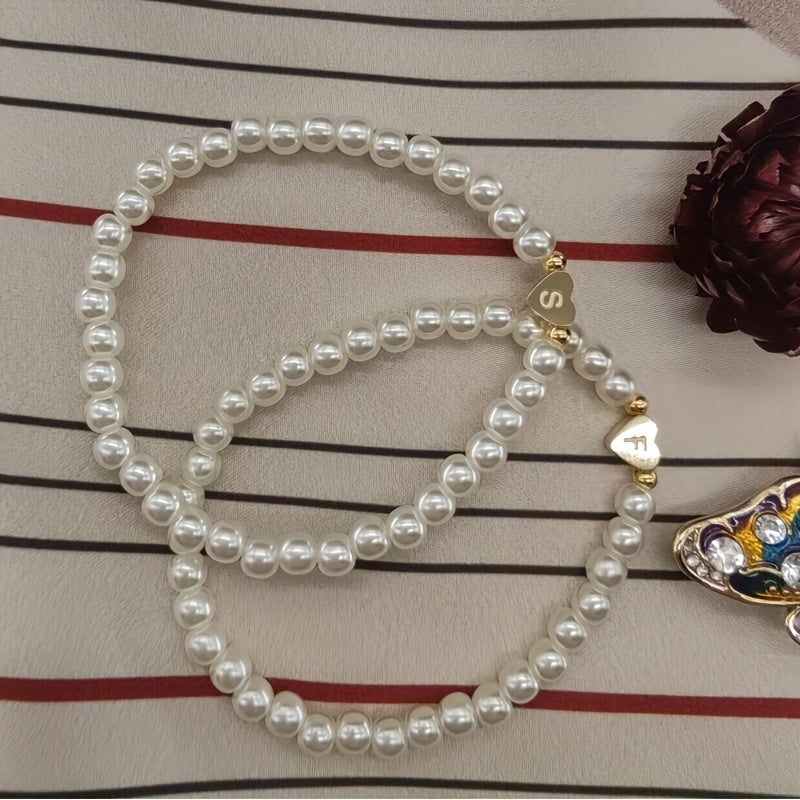 Pulsera chic con inicial A-Z y corazón