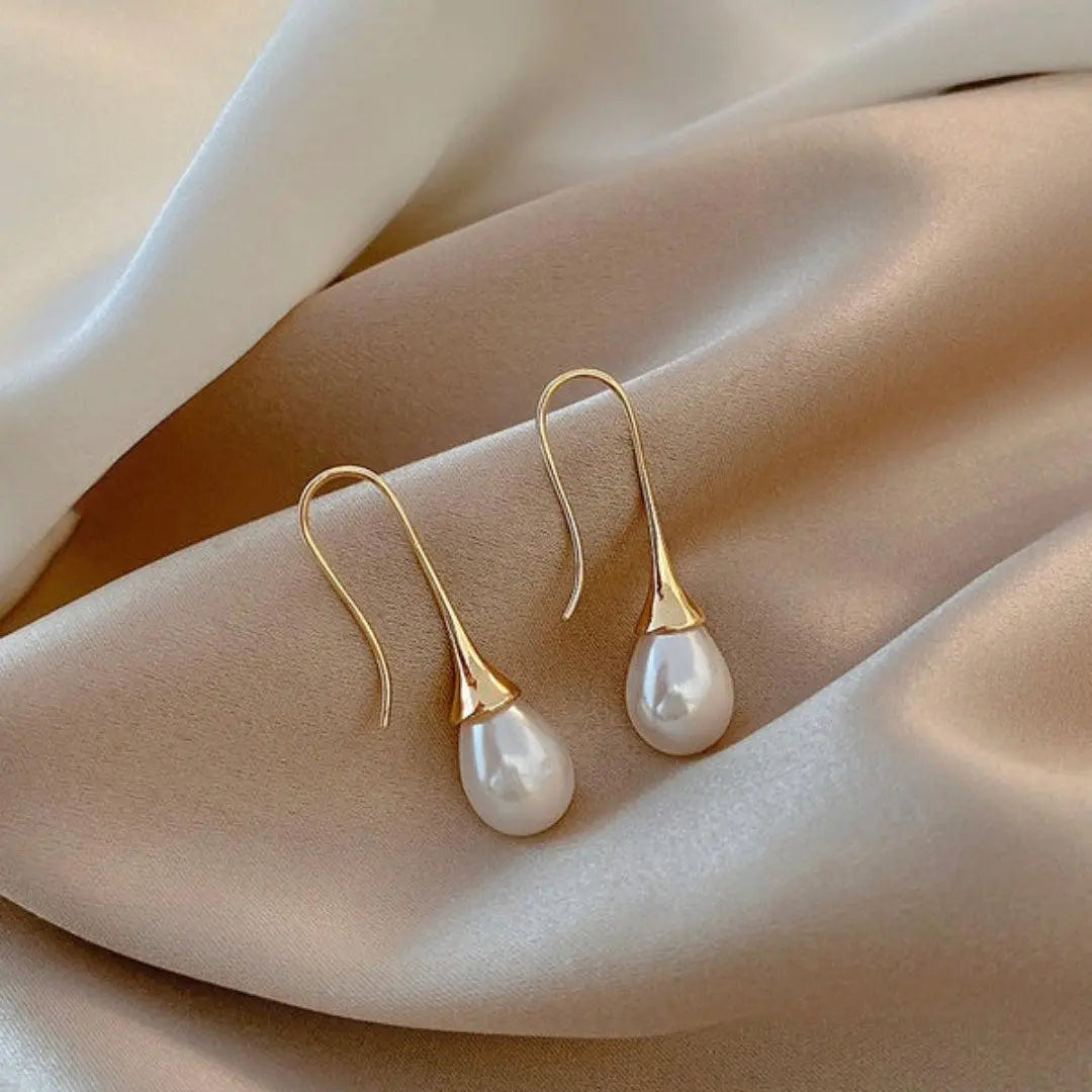 Boucles d'oreilles pendantes perle en or