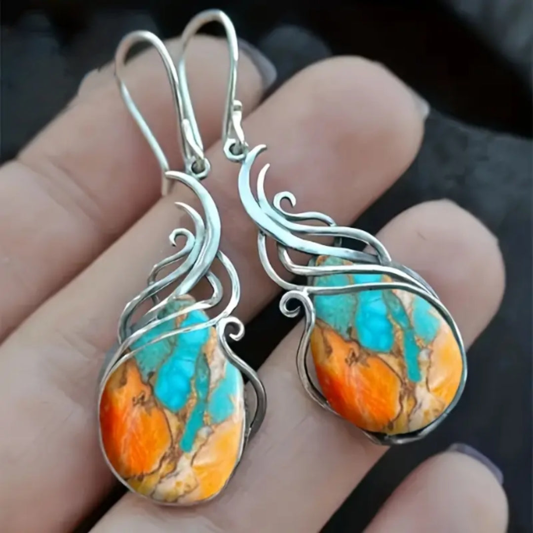 Boucles d’oreilles pendantes élégantes avec pierre précieuse