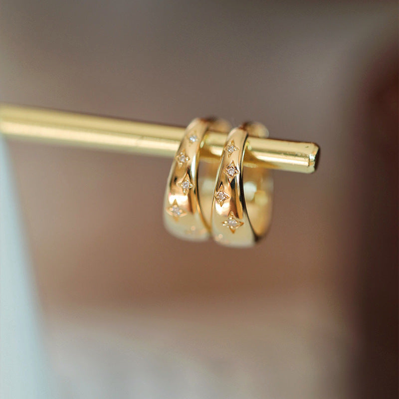 Pendientes lujosos en oro y plata