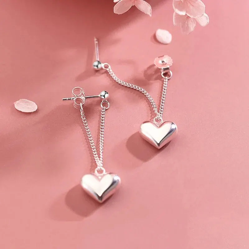 Aretes de aro geométricos en forma de corazón de inspiración antigua