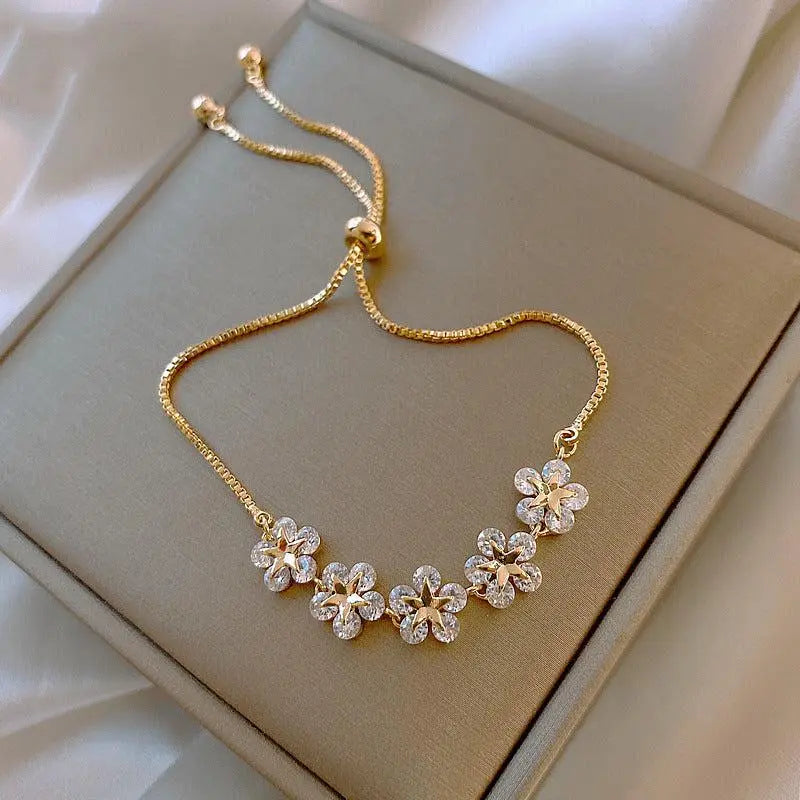 Pulsera margarita de cristal en oro