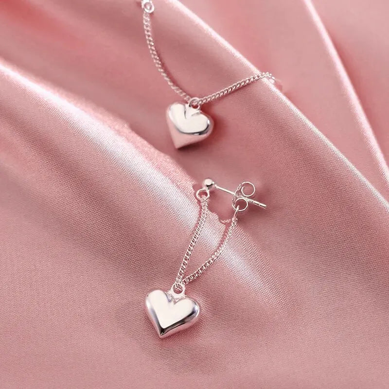 Aretes de aro geométricos en forma de corazón de inspiración antigua