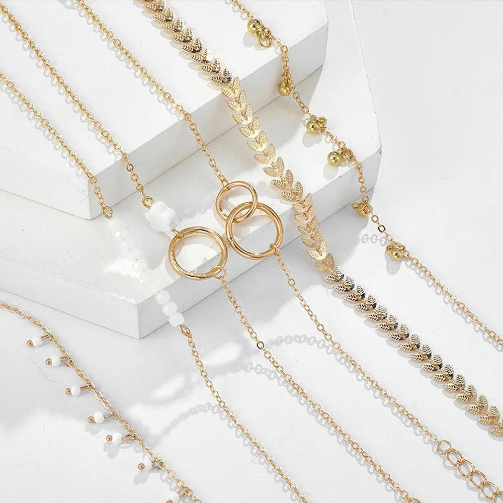 Conjunto de pulseras bohemias doradas encantadoras