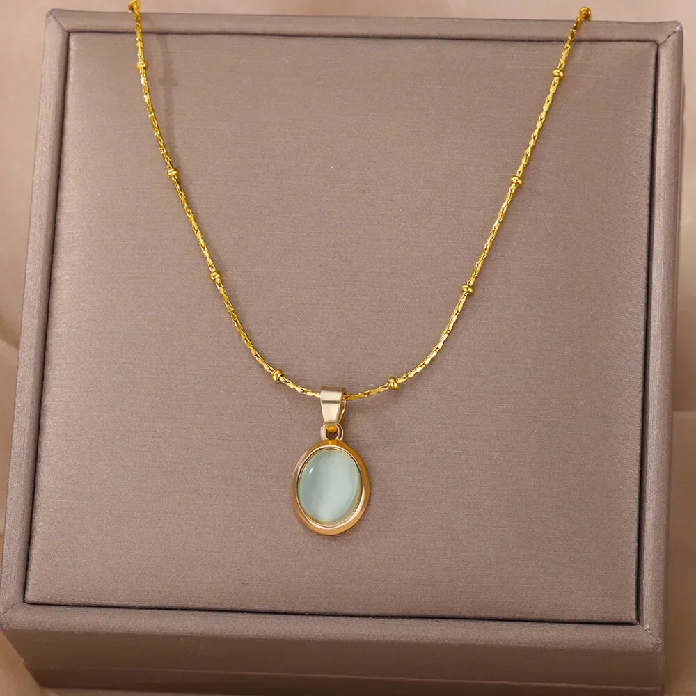 Collar elegante de acero inoxidable dorado con colgante de ópalo en forma de gota de agua