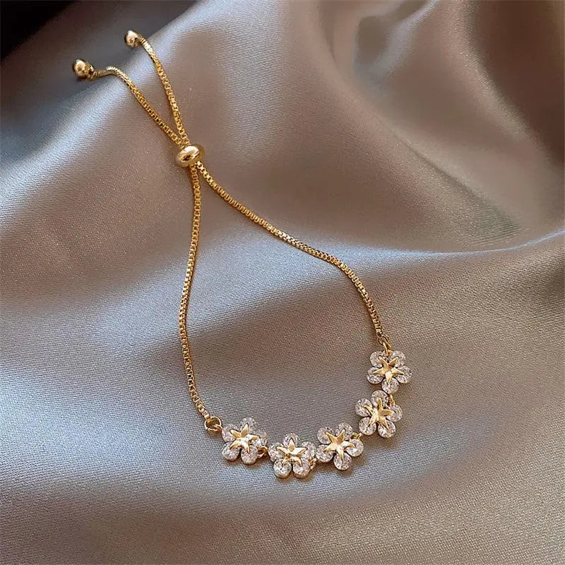 Pulsera margarita de cristal en oro