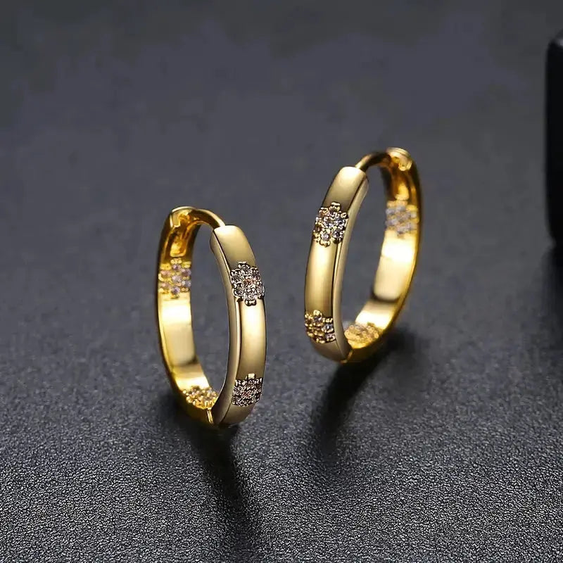 Aretes de aro vintage con flor dorada