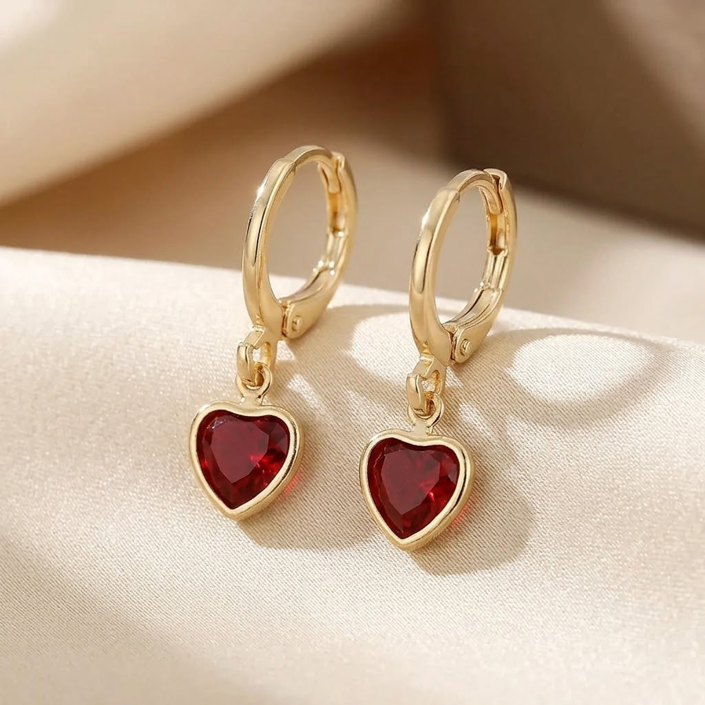 Boucles d'oreilles pendantes cœur rubis et or