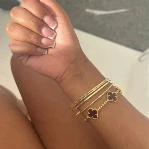 CLOVER | Pulsera Negro/Dorado