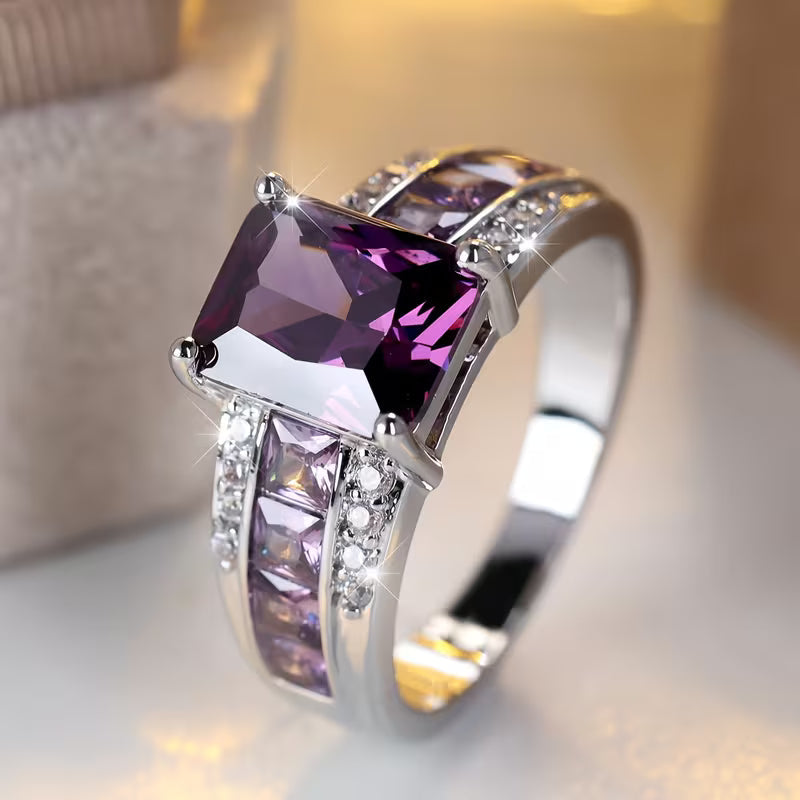 Bague améthyste sertie canal en argent