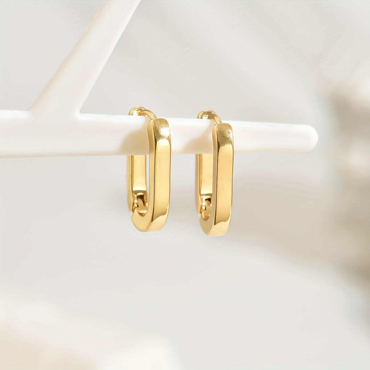 Aretes de aro geométricos elegantes