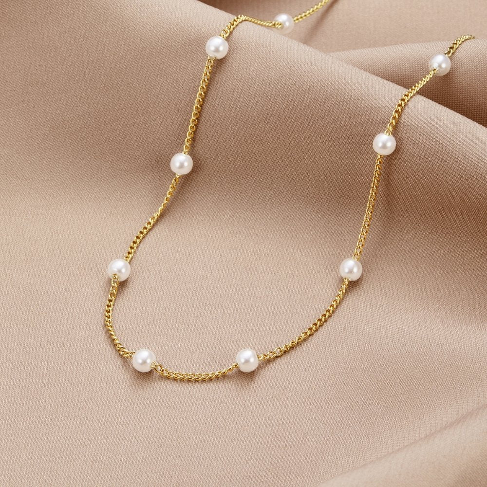 Collar de cadena con perlas