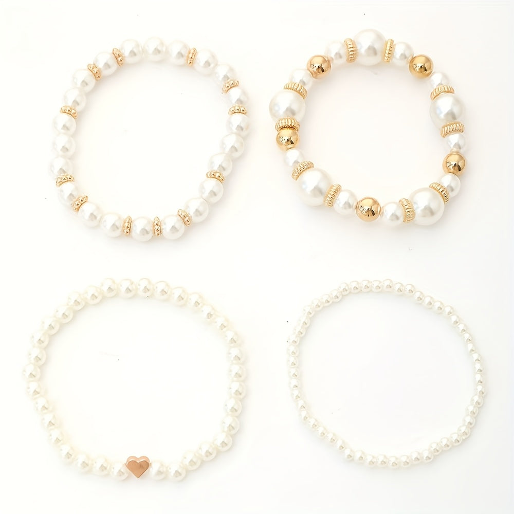 Conjunto de pulseras elegantes con perlas y corazón