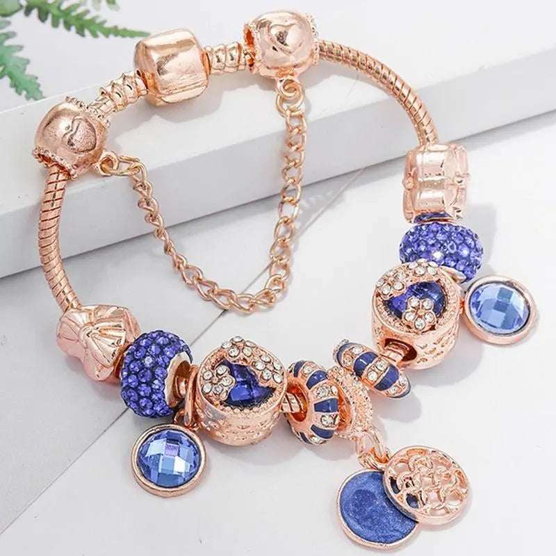 Pulsera en oro rosa con cristal azul