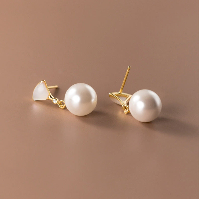 Boucles d’oreilles chic en argent avec perles