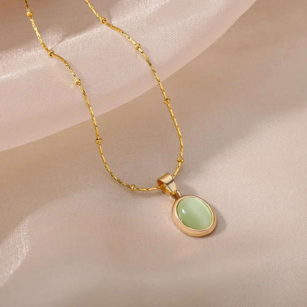 Collar elegante de acero inoxidable dorado con colgante de ópalo en forma de gota de agua
