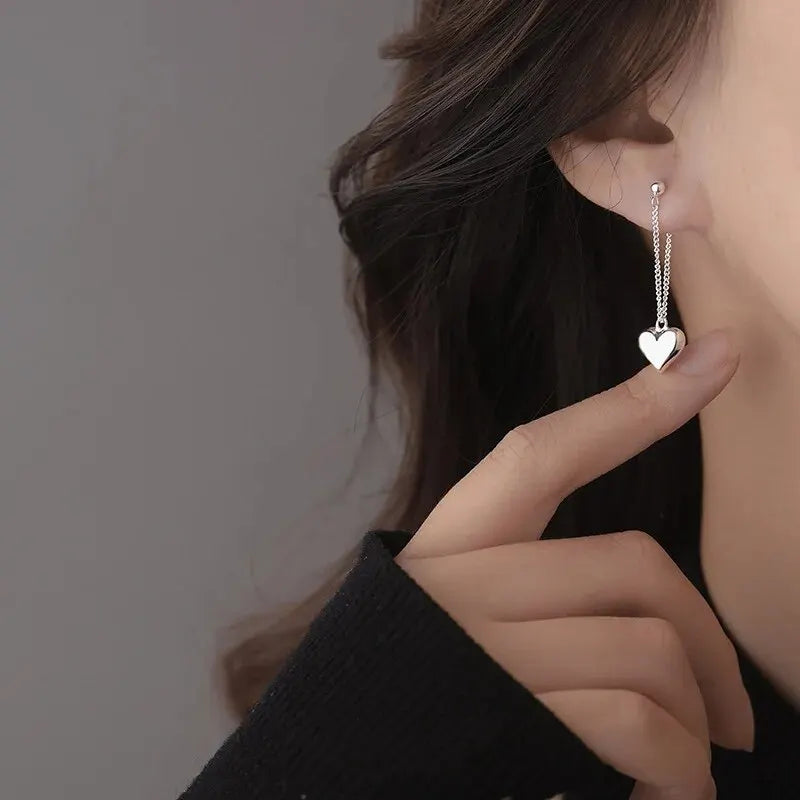Aretes de aro geométricos en forma de corazón de inspiración antigua