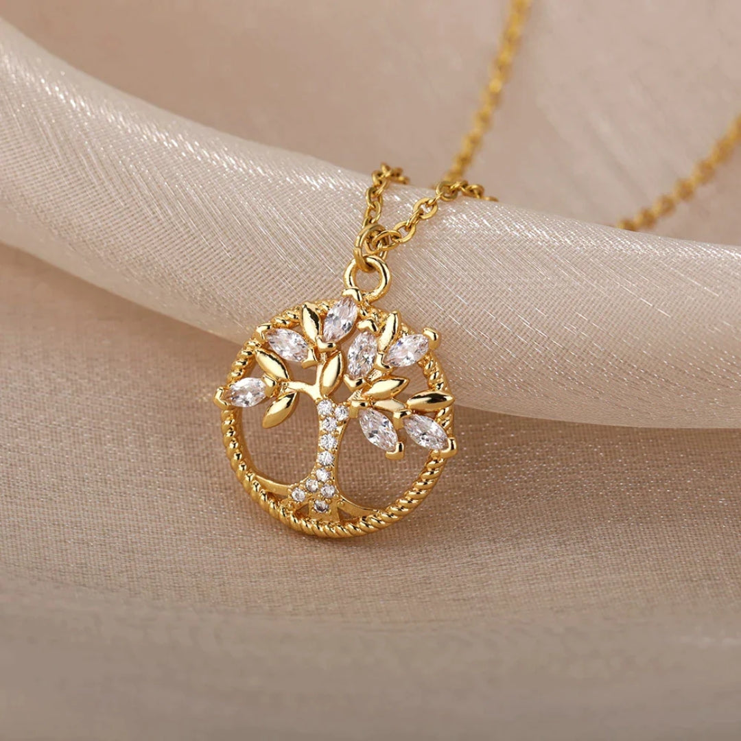 Collar dorado con dije de árbol de la vida y cristal