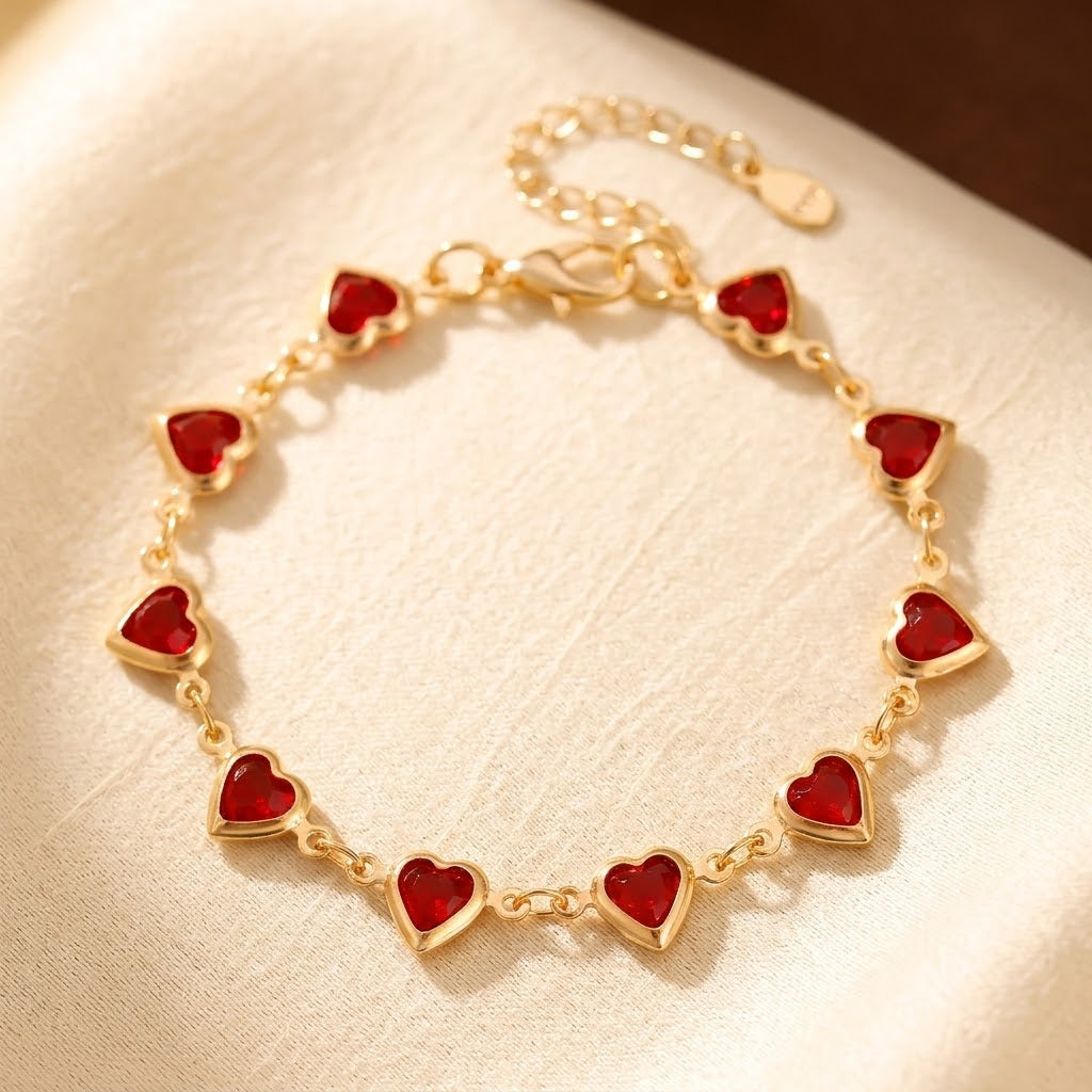 Bracelet chaîne cœur rubis en or