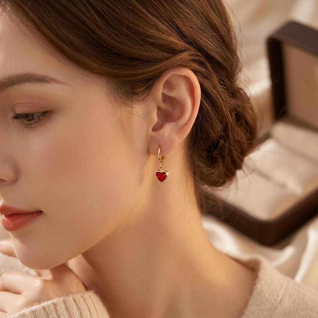 Boucles d'oreilles pendantes cœur rubis et or