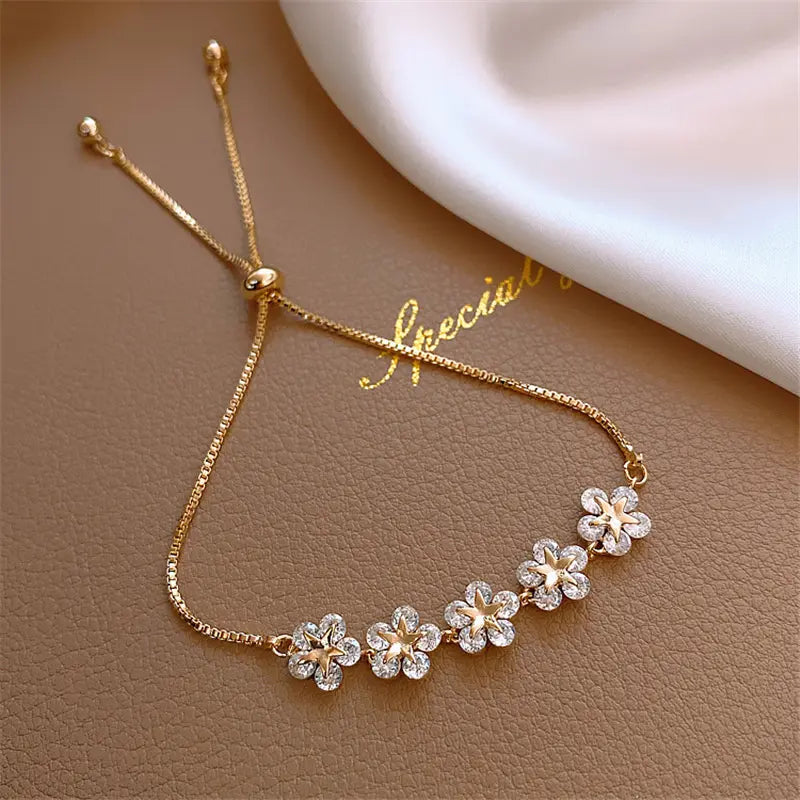 Pulsera margarita de cristal en oro
