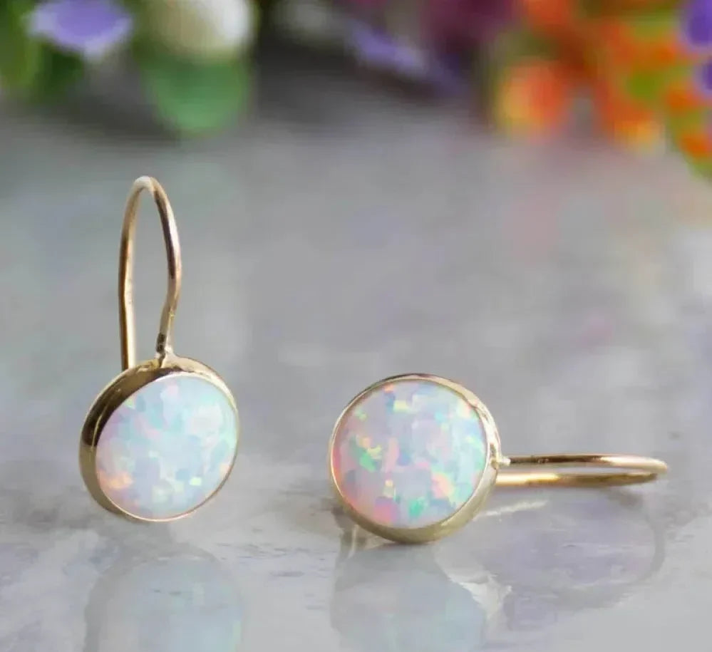 Boucles d’oreilles vintage dorées avec opale